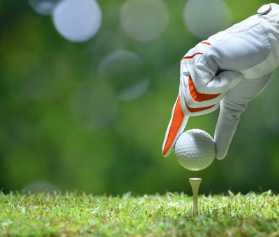 hand-hold-golf-ball-with-tee-golf-course_126277-323 hand-hold-golf-ball-with-tee-golf-course_126277-323
